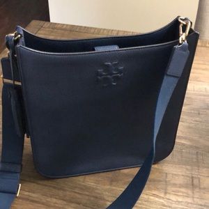 Navy crossbody.  Leather bag with woven wide adjustable strap.